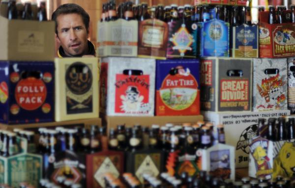 David Boone of Bristol Brewing Co. looks over several brands of Colorado craft beer