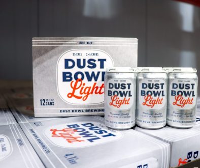 Dust Bowl Light Lager can and glass, showcasing a crisp, refreshing craft light lager from Dust Bowl Brewing Co.